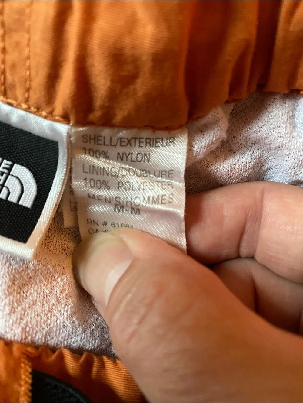The North Face Men's Orange Athletic Shorts with Buckle Waist